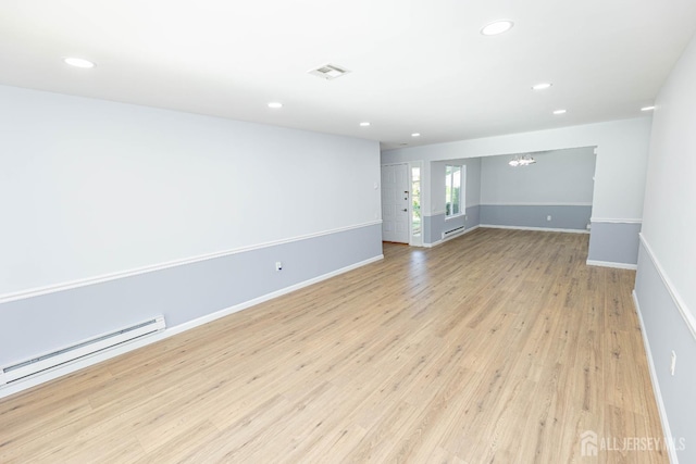 372-B Duranta Plz, Monroe, NJ 08831 - spare room featuring recessed lighting, a baseboard radiator, light wood-style floors, and a chandelier