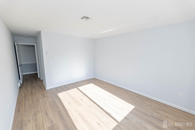 372-B Duranta Plz, Monroe, NJ 08831 - empty room featuring light wood-style floors and baseboards