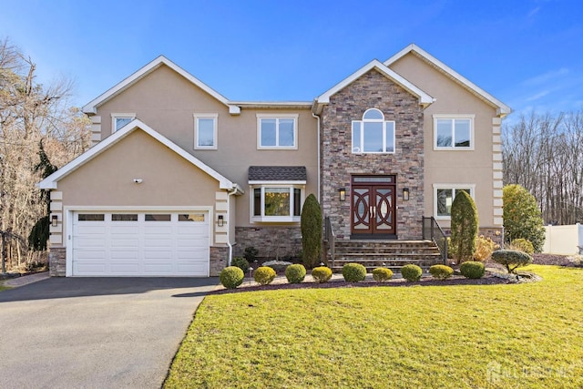 6 Alex Ct, Monroe, NJ 08831 - view of front of home featuring stone siding, stucco siding, a front yard, and asphalt driveway