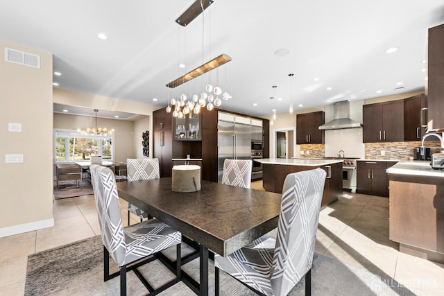 6 Alex Ct, Monroe, NJ 08831 - dining room with recessed lighting, a chandelier, light tile patterned flooring, and baseboards