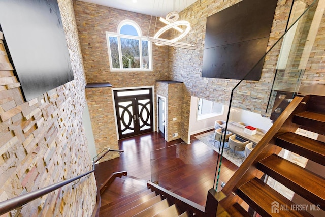 6 Alex Ct, Monroe, NJ 08831 - staircase with wood finished floors and a chandelier