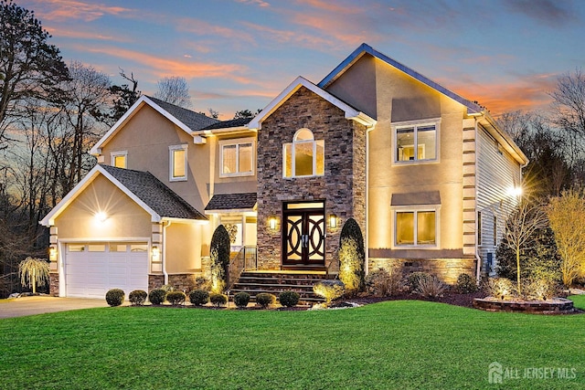 6 Alex Ct, Monroe, NJ 08831 - view of front of house with stone siding, a lawn, driveway, and stucco siding