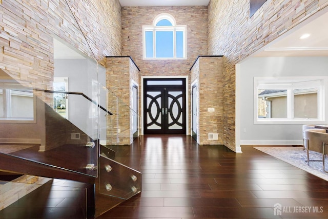 6 Alex Ct, Monroe, NJ 08831 - entryway with wood finished floors, a high ceiling, and baseboards