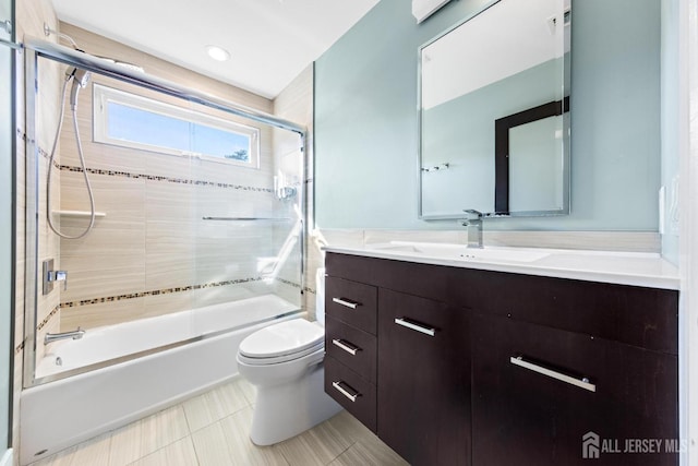 6 Alex Ct, Monroe, NJ 08831 - bathroom featuring toilet, vanity, bath / shower combo with glass door, and tile patterned flooring