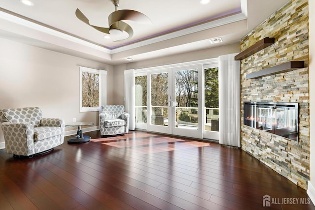6 Alex Ct, Monroe, NJ 08831 - sitting room with a tray ceiling, ceiling fan, crown molding, a fireplace, and wood-type flooring