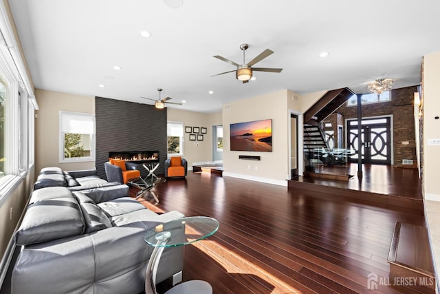 6 Alex Ct, Monroe, NJ 08831 - living room with a fireplace, stairs, ceiling fan, hardwood / wood-style flooring, and recessed lighting