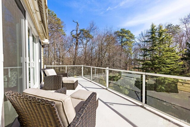 6 Alex Ct, Monroe, NJ 08831 - balcony with view of wooded area