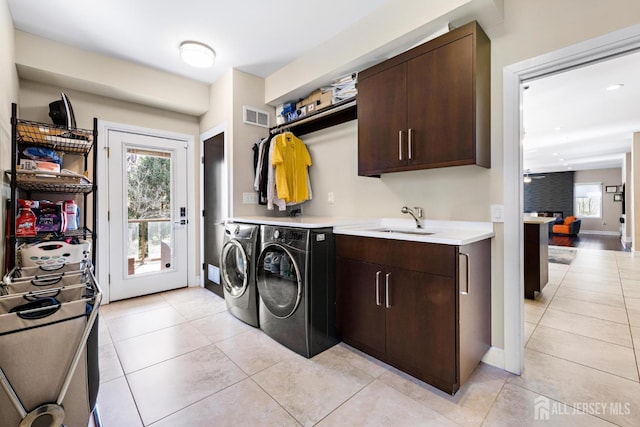 6 Alex Ct, Monroe, NJ 08831 - laundry area featuring light tile patterned floors, washing machine and dryer, and baseboards