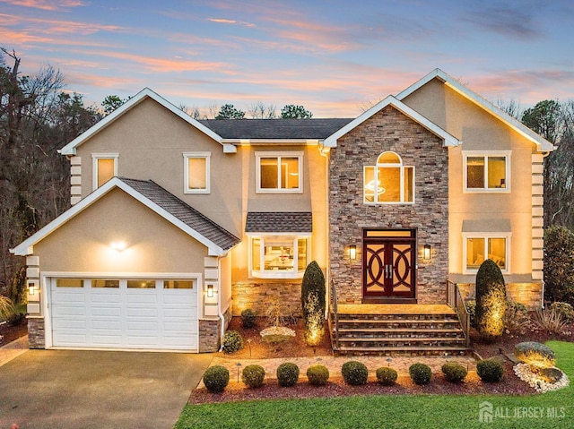 6 Alex Ct, Monroe, NJ 08831 - traditional-style house featuring stone siding, concrete driveway, stucco siding, and a garage