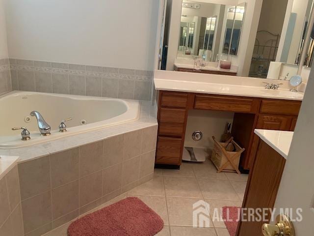 47 Stony Path Dr, South Brunswick, NJ 08810 - bathroom with tile patterned floors, a whirlpool tub, and vanity