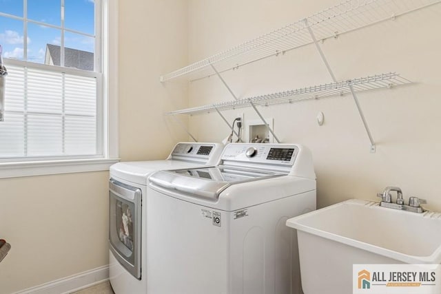 20 Washingtons Xing, Monroe, NJ 08831 - washroom with washing machine and clothes dryer, healthy amount of natural light, and baseboards