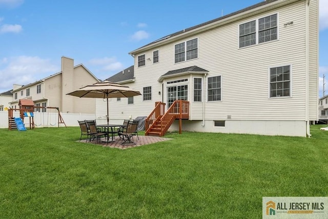 20 Washingtons Xing, Monroe, NJ 08831 - rear view of property with a playground, a yard, crawl space, and a patio area
