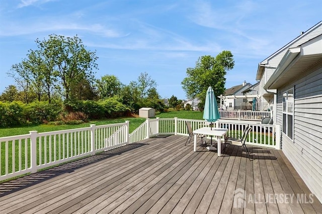 46 Carriage Dr, Piscataway, NJ 08854 - wooden terrace featuring a lawn and outdoor dining space