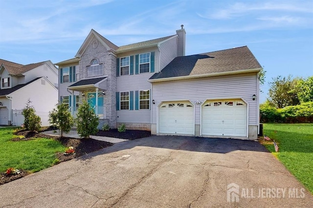 46 Carriage Dr, Piscataway, NJ 08854 - view of front of house with a garage, driveway, a chimney, and a front yard