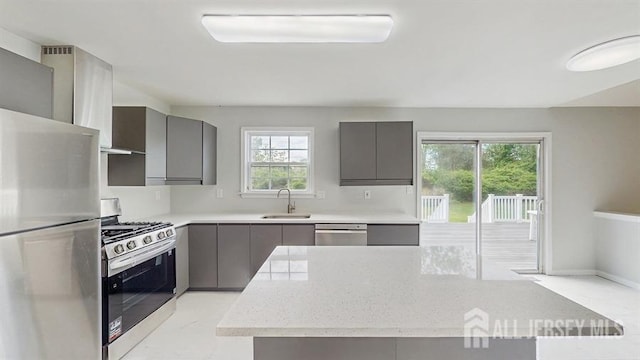 46 Carriage Dr, Piscataway, NJ 08854 - kitchen featuring gray cabinetry, stainless steel appliances, a sink, and modern cabinets