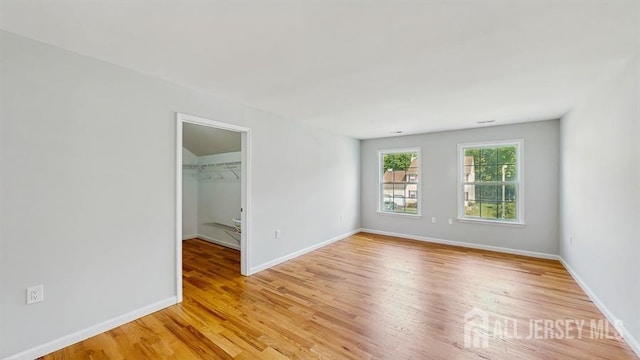 46 Carriage Dr, Piscataway, NJ 08854 - empty room featuring light wood-style floors and baseboards