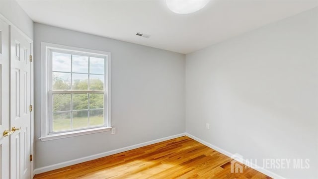 46 Carriage Dr, Piscataway, NJ 08854 - unfurnished room featuring light wood-style flooring and baseboards