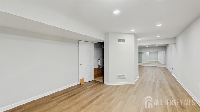 46 Carriage Dr, Piscataway, NJ 08854 - spare room featuring light wood-type flooring, recessed lighting, and baseboards