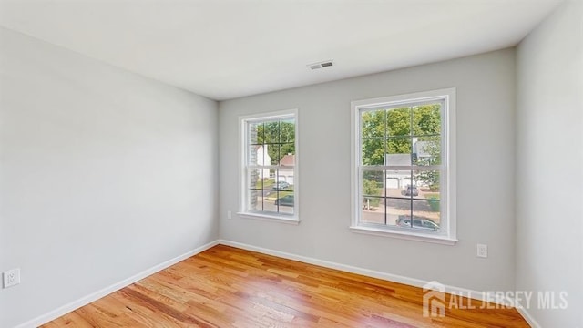 46 Carriage Dr, Piscataway, NJ 08854 - empty room featuring baseboards and light wood-style floors