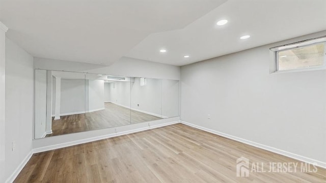 46 Carriage Dr, Piscataway, NJ 08854 - basement with baseboards, wood finished floors, and recessed lighting