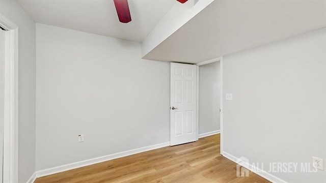 46 Carriage Dr, Piscataway, NJ 08854 - spare room featuring a ceiling fan, baseboards, and light wood-type flooring