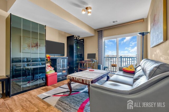 living room with hardwood / wood-style flooring