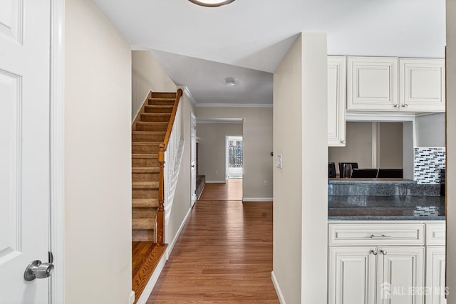 251 Chaucer Ct, Old Bridge, NJ 08857 - hallway featuring light wood finished floors, stairway, crown molding, and baseboards