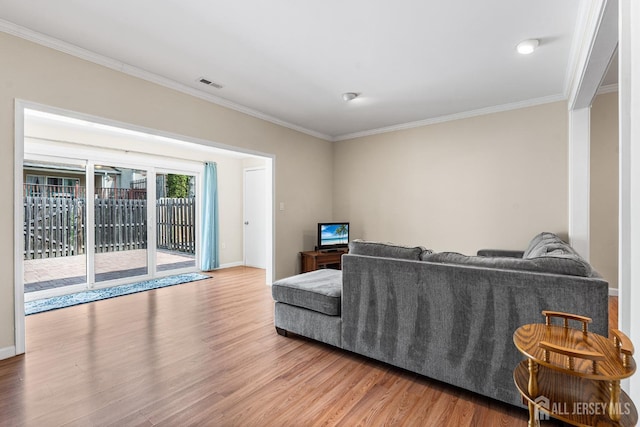 251 Chaucer Ct, Old Bridge, NJ 08857 - living room with crown molding, wood finished floors, and baseboards