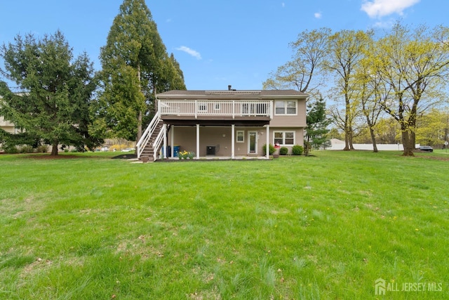 4 Rieder Ct, Franklin Twsp, NJ 08873 - rear view of house with a lawn, a wooden deck, and stairway