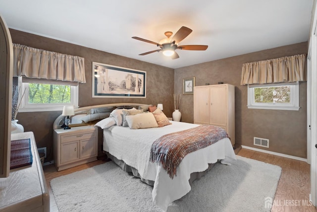 4 Rieder Ct, Franklin Twsp, NJ 08873 - bedroom featuring light wood-style floors, baseboards, a ceiling fan, and visible vents