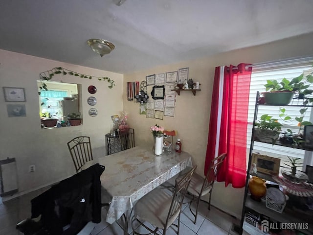308 Seaman St, New Brunswick, NJ 08901 - dining space featuring tile patterned floors