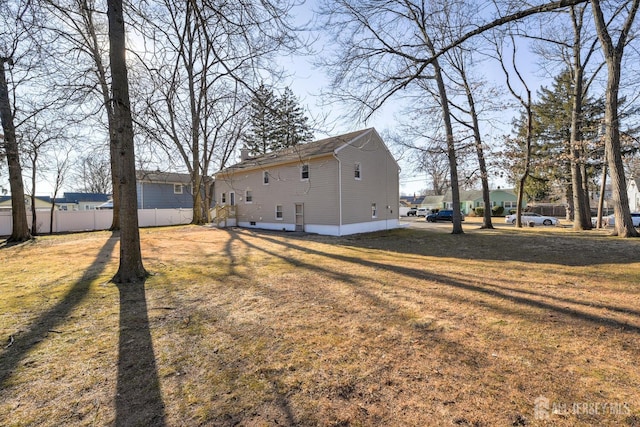 view of yard with fence