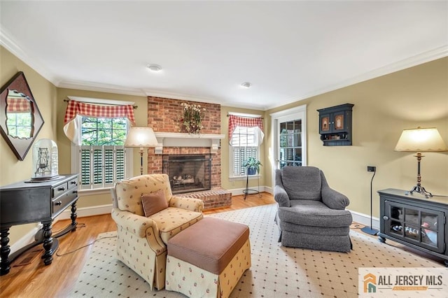 35 Parkview Rd, Cranbury, NJ 08512 - living area featuring ornamental molding, wood finished floors, and a brick fireplace