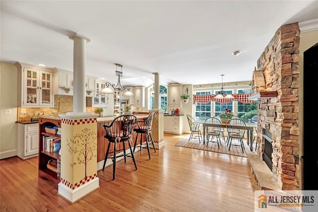 35 Parkview Rd, Cranbury, NJ 08512 - kitchen featuring decorative columns, a chandelier, and open shelves