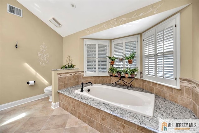 35 Parkview Rd, Cranbury, NJ 08512 - bathroom featuring a garden tub, tile patterned floors, and lofted ceiling