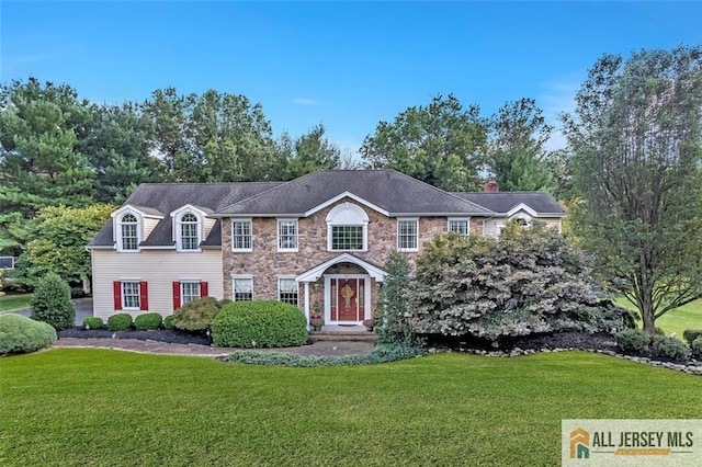 35 Parkview Rd, Cranbury, NJ 08512 - colonial inspired home with a front lawn, stone siding, and a chimney