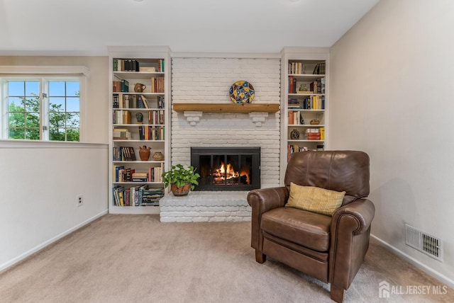 26 Magnolia Rd, Franklin Twsp, NJ 08873 - living area with carpet floors, a brick fireplace, and baseboards