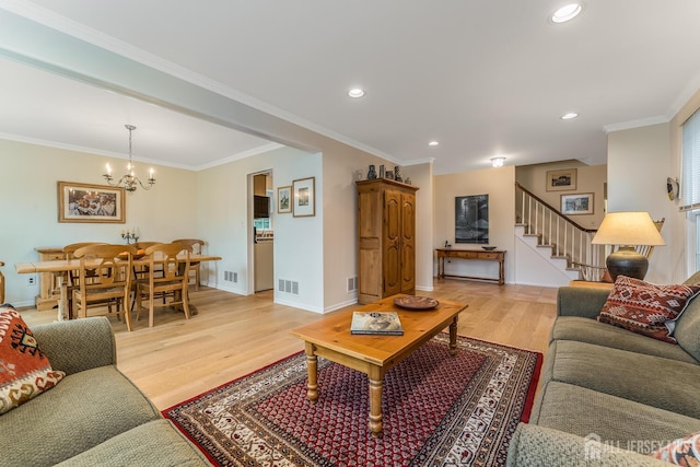 26 Magnolia Rd, Franklin Twsp, NJ 08873 - living room featuring light wood-style floors, a chandelier, stairs, recessed lighting, and baseboards