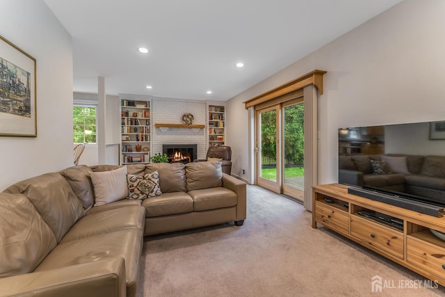 26 Magnolia Rd, Franklin Twsp, NJ 08873 - living room featuring light carpet, recessed lighting, and a brick fireplace