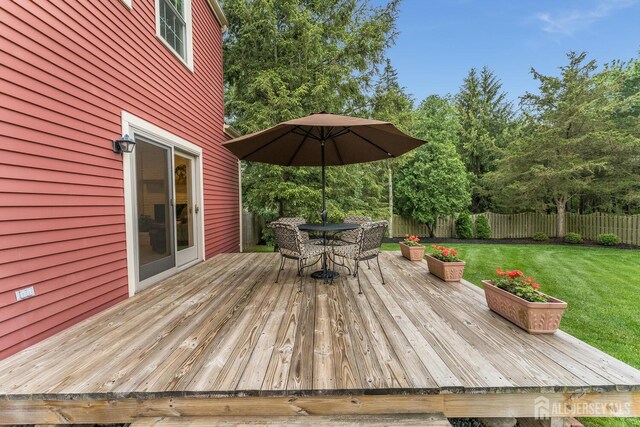 26 Magnolia Rd, Franklin Twsp, NJ 08873 - deck with outdoor dining space and view of scattered trees
