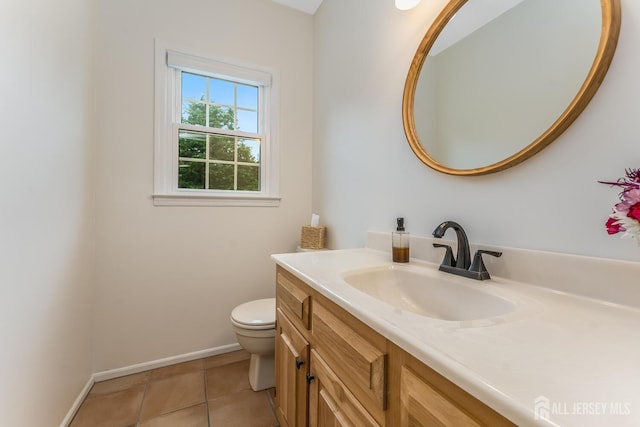 26 Magnolia Rd, Franklin Twsp, NJ 08873 - bathroom featuring vanity, toilet, baseboards, and tile patterned floors