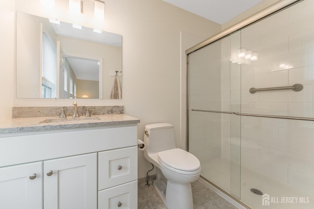 26 Magnolia Rd, Franklin Twsp, NJ 08873 - bathroom with a shower stall, vanity, and tile patterned floors