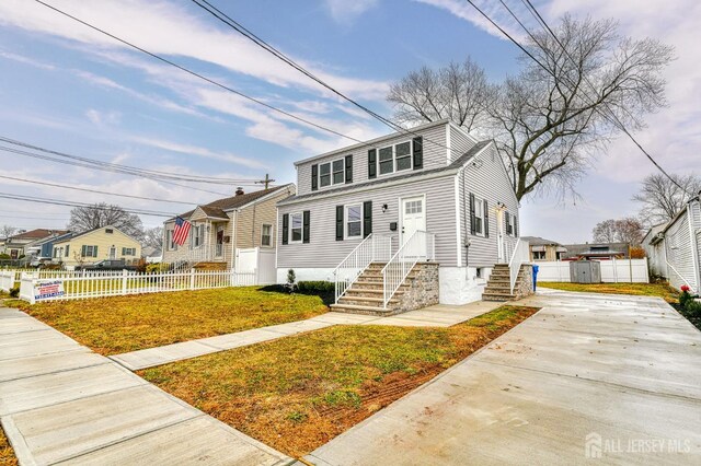 view of front of home with a front yard