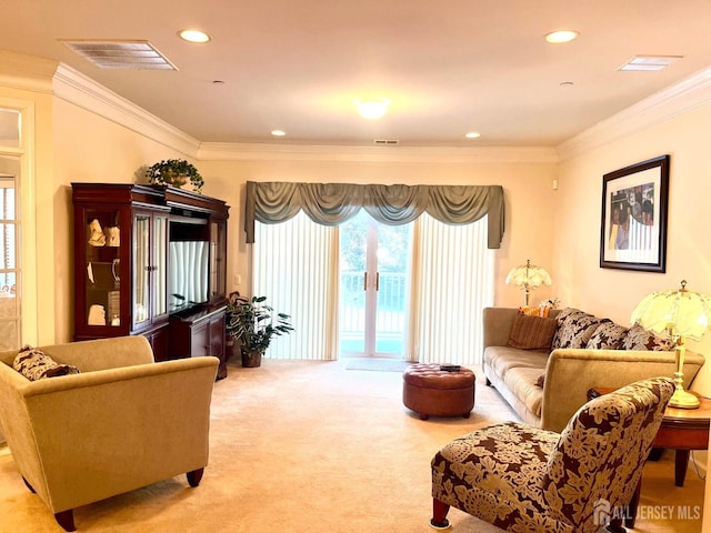 living area featuring ornamental molding, visible vents, and light carpet