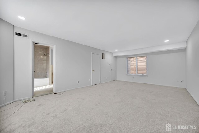 interior space with visible vents, recessed lighting, and baseboards