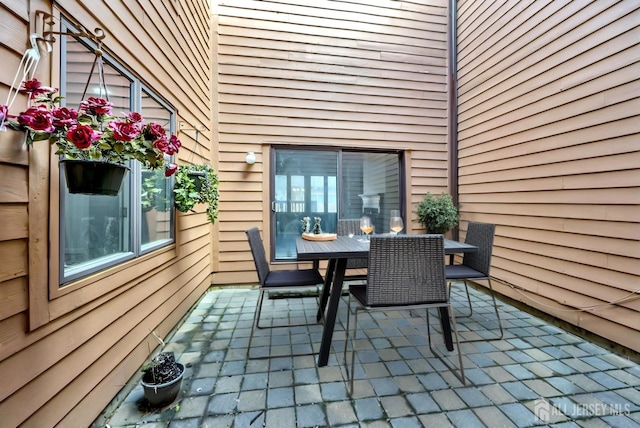 view of patio featuring outdoor dining space