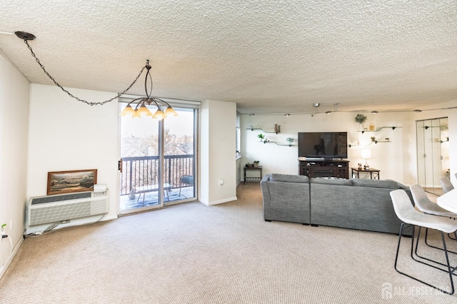 carpeted living room with a textured ceiling, baseboards, and an AC wall unit