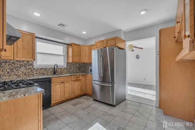 kitchen with sink, dishwasher, tasteful backsplash, stainless steel fridge, and light tile patterned floors