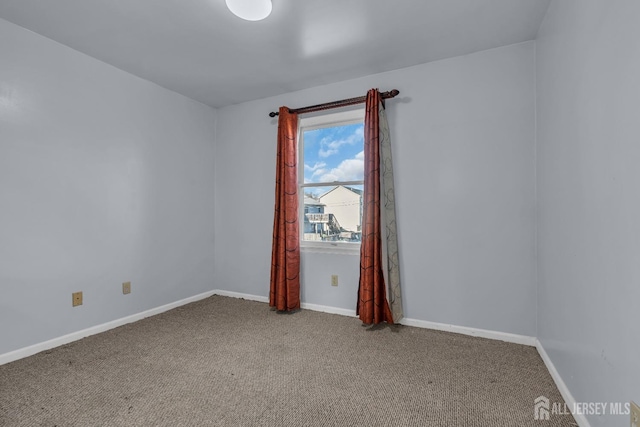 view of carpeted spare room