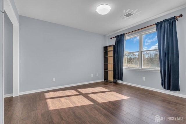 unfurnished room featuring dark hardwood / wood-style floors